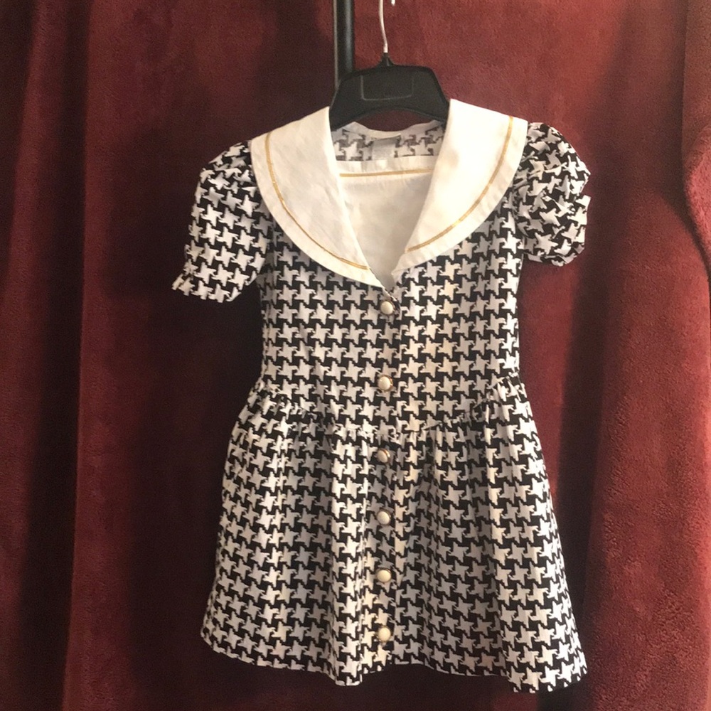 Girls dress, Size 7, Black and white with gold trim, white collar, button front,